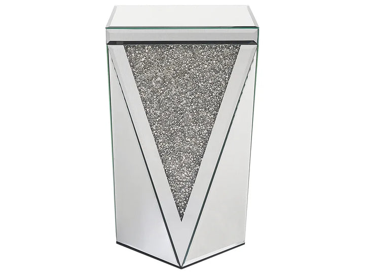 Decorative side table with mirror finish and glittery pattern on a white background