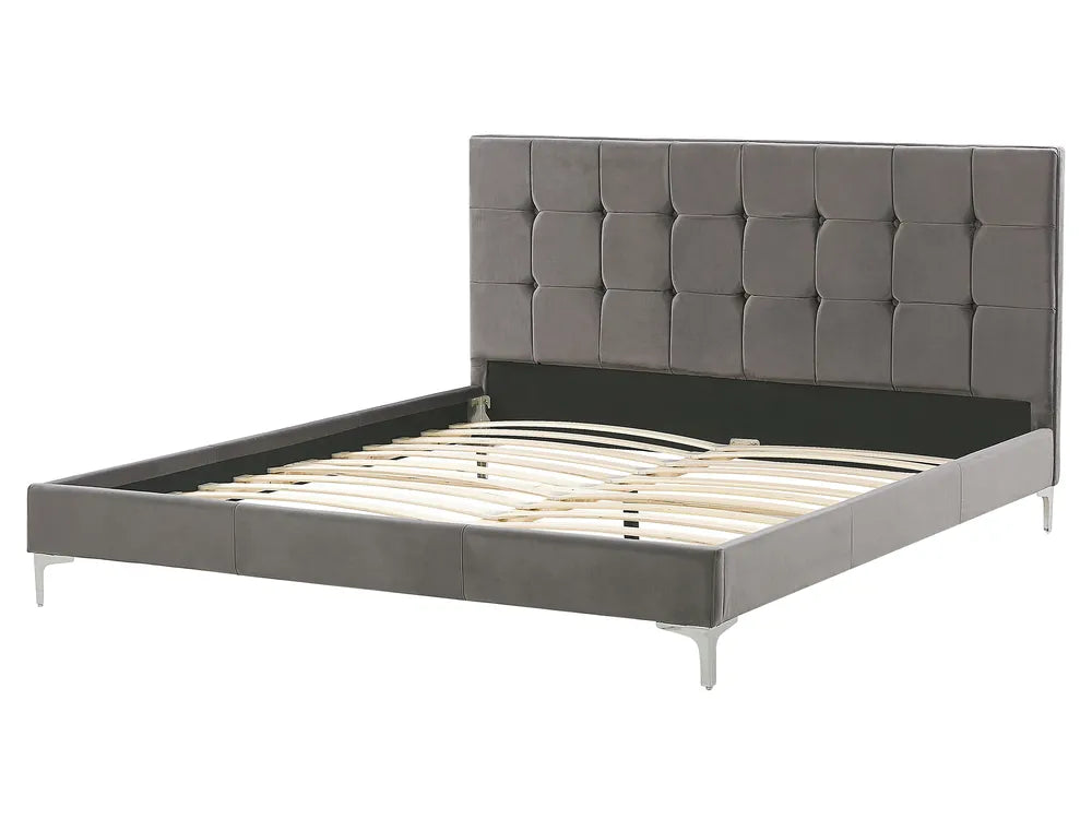 Gray upholstered bed frame on a white background