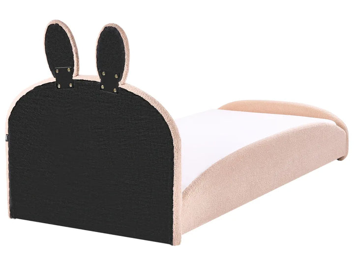 Children's bed with bunny ears design on a white background