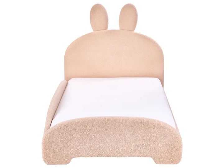 Children's chair with bunny ears and white cushion on a white background