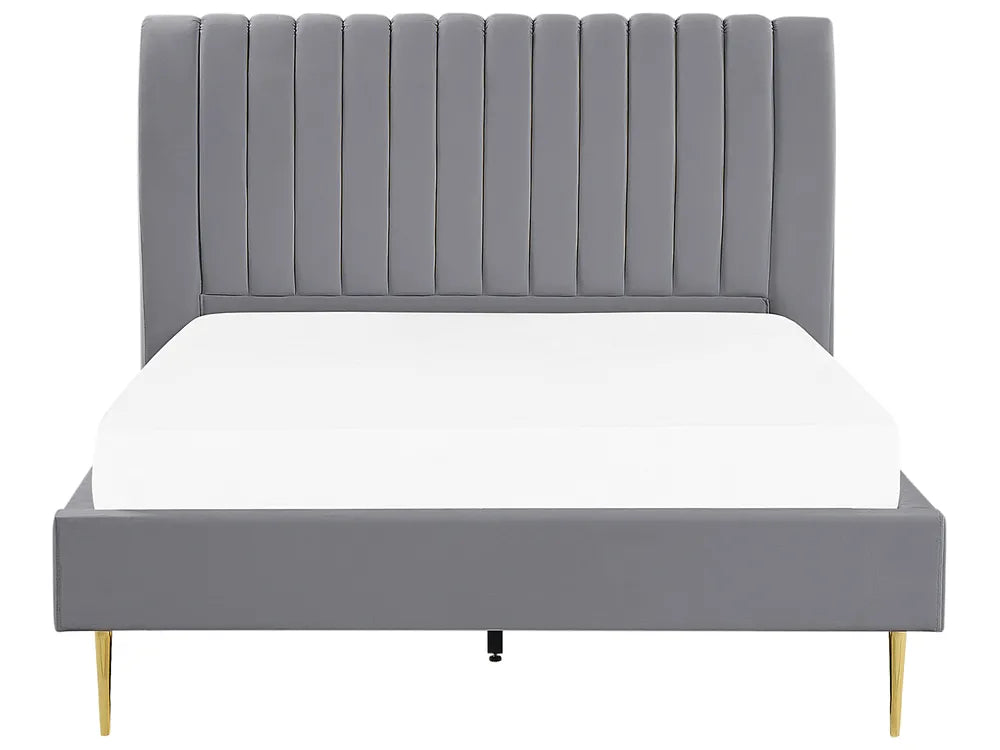 Gray upholstered bed with white mattress on a white background