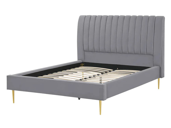 Gray upholstered bed with tufted headboard on a white background