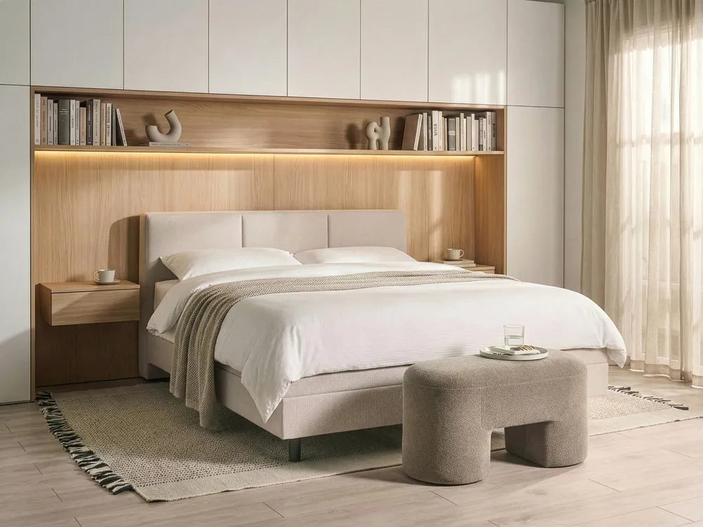 Modern bedroom with a bed, nightstands, and bookshelf.