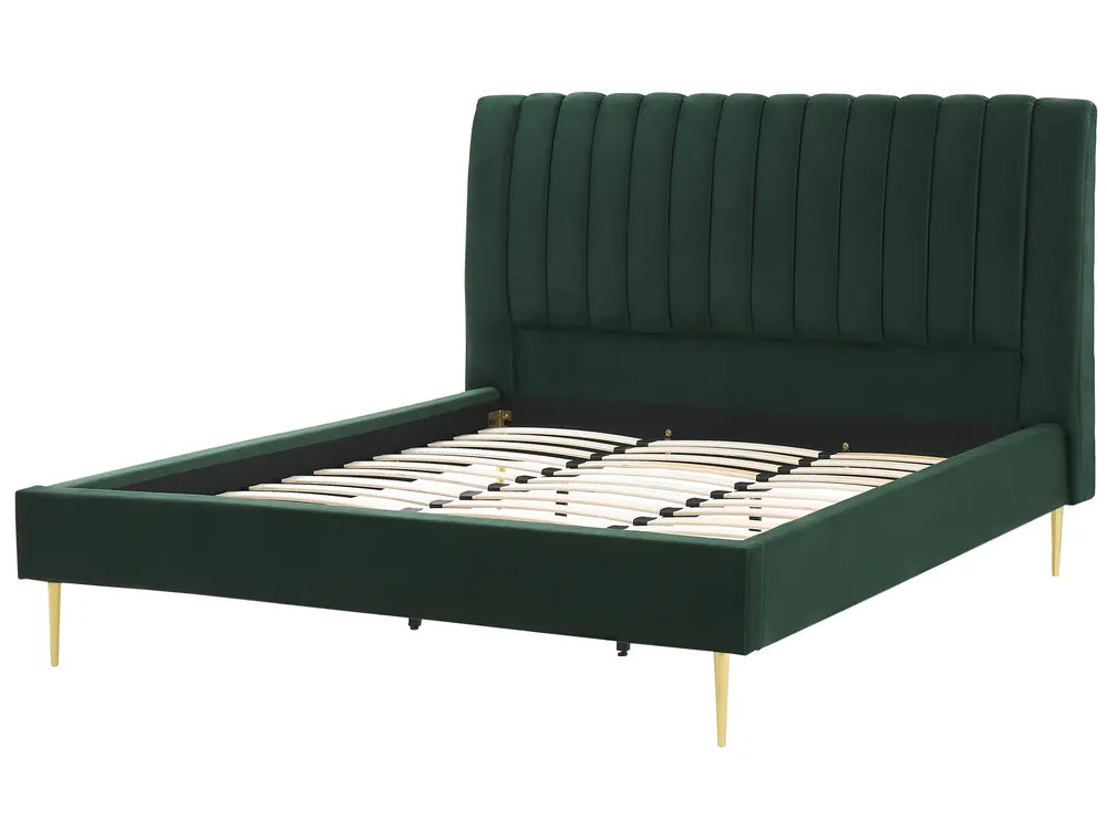 Green upholstered bed with gold legs on a white background