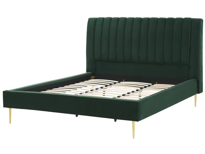 Green upholstered bed with gold legs on a white background