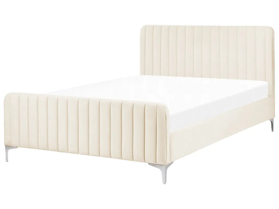 Light beige velvet double bed with upholstered headboard