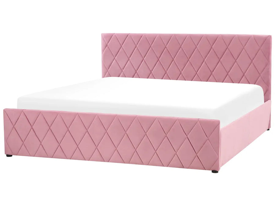 Pink quilted bed with white mattress on a white background