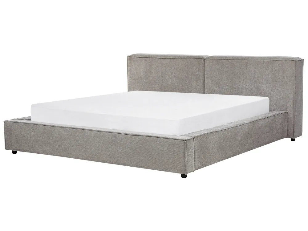 Gray upholstered bed with white mattress on a white background