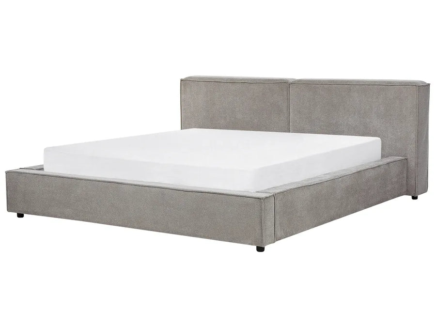 Gray upholstered bed with white mattress on a white background