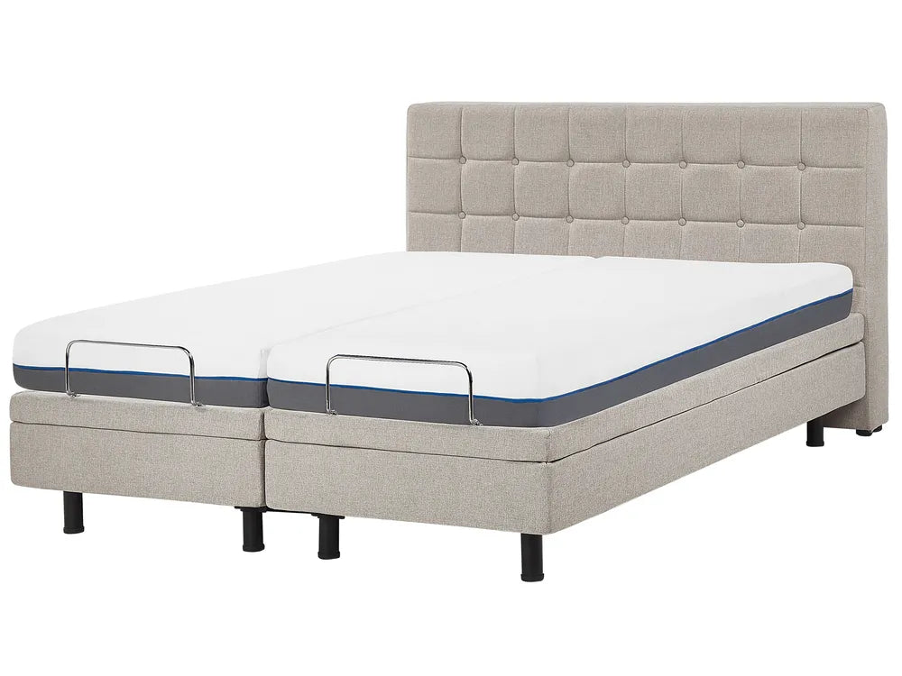 Gray adjustable bed with mattress on a white background