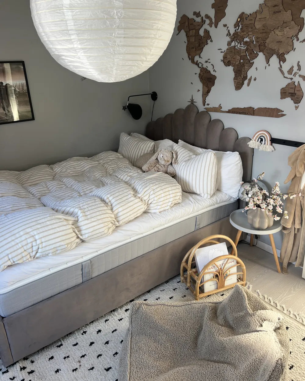 Modern taupe ottoman bed with tufted headboard design