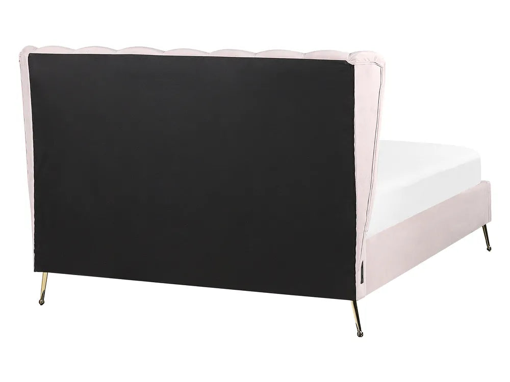 Bed with black headboard and pink sides on a white background