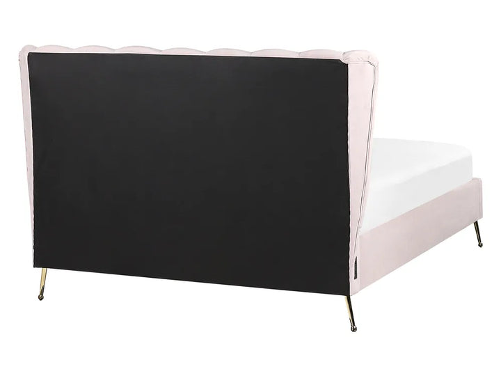 Bed with black headboard and pink sides on a white background