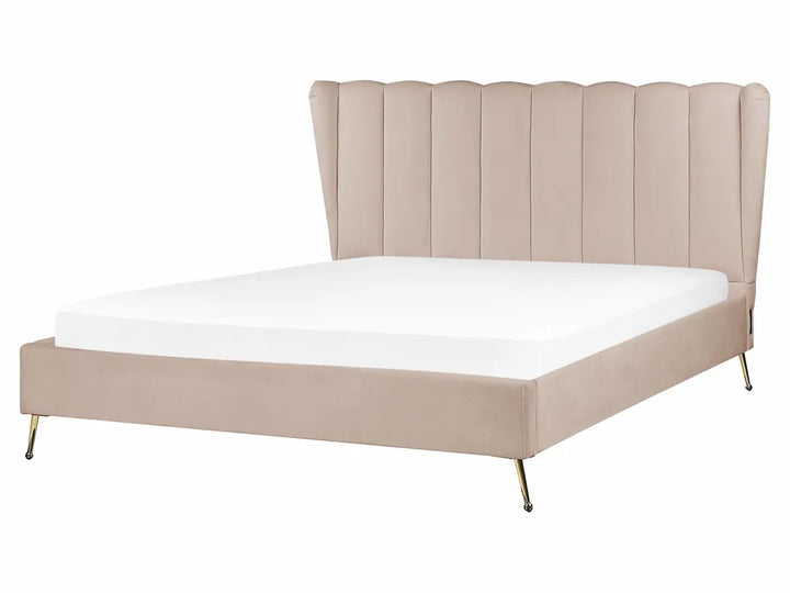 Beige upholstered bed with white mattress on a white background