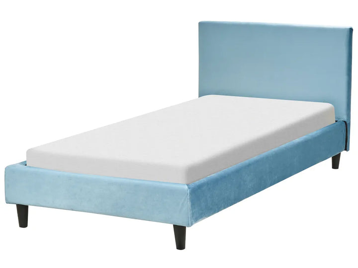 Blue upholstered bed with white mattress on a white background