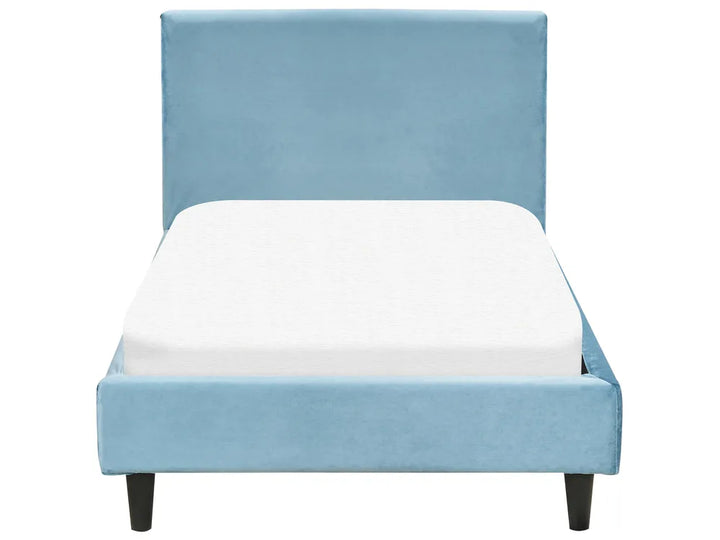 Blue upholstered bed with white mattress on a white background