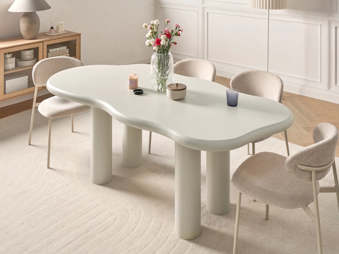 Modern dining table with unique design in a minimalistic room