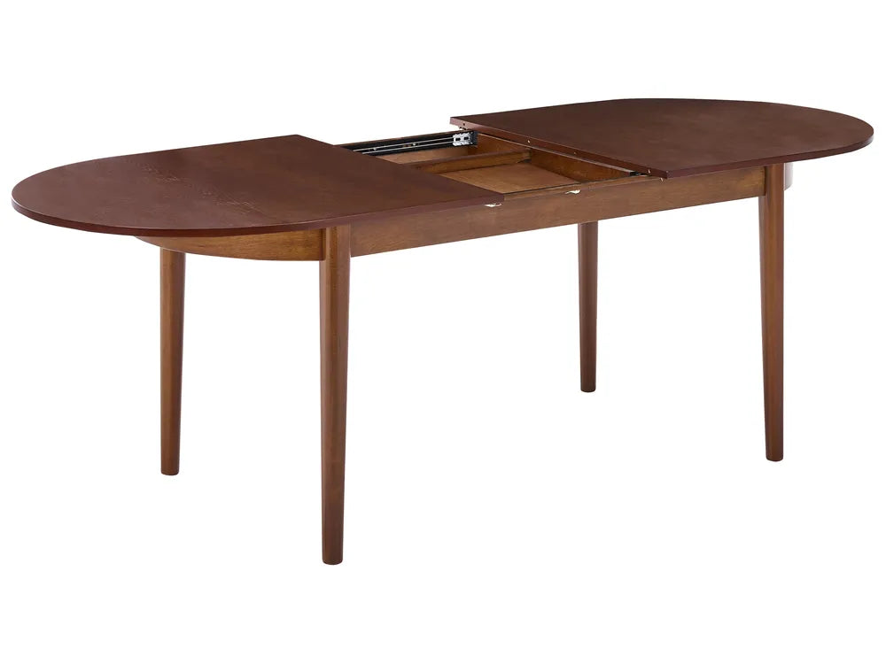 Wooden dining table with an extended leaf on a white background