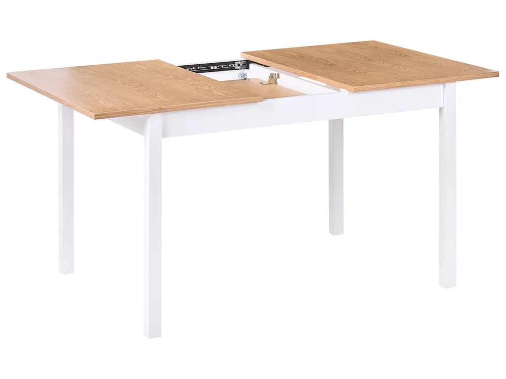 Wooden table with white legs on a white background