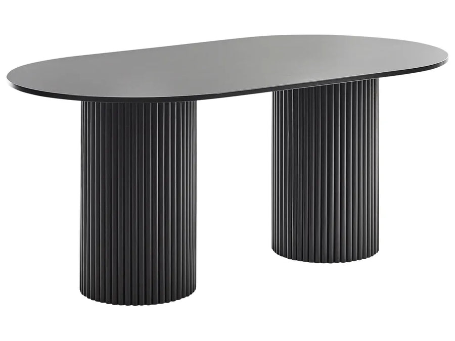 Modern black dining table with ribbed cylindrical legs on a white background