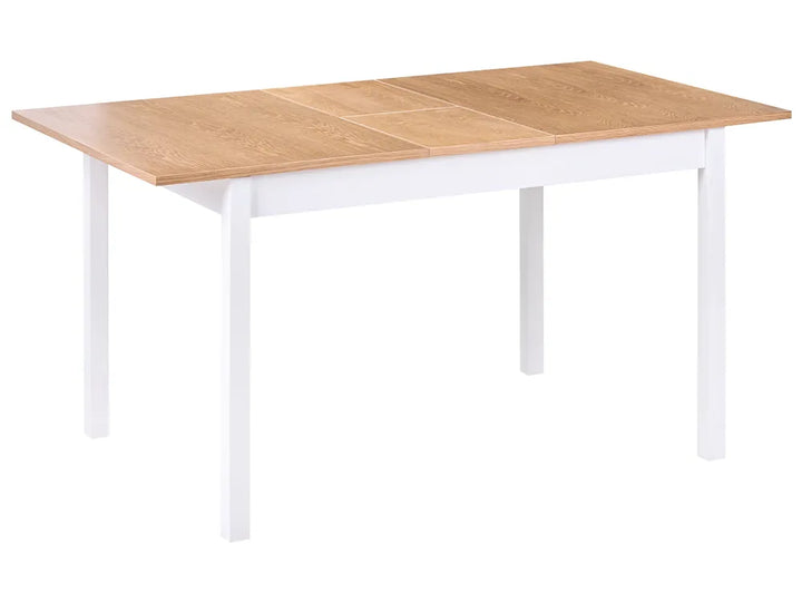 Wooden table with white legs on a white background