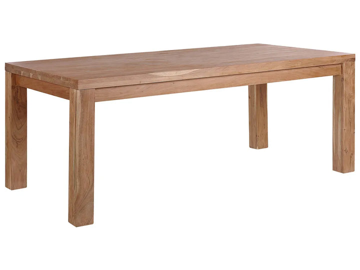 Wooden dining table on a white background