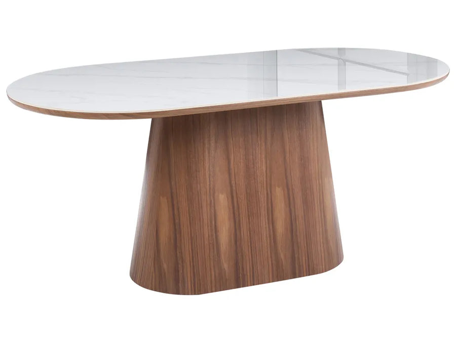 Modern dining table with wooden base and glass top on a white background