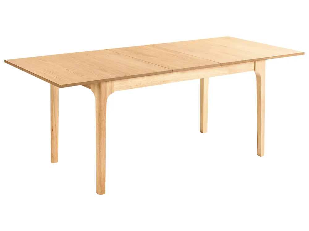 Wooden dining table on a white background