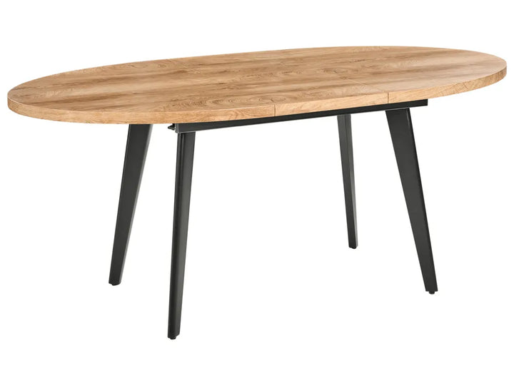 Wooden dining table with black legs on a white background