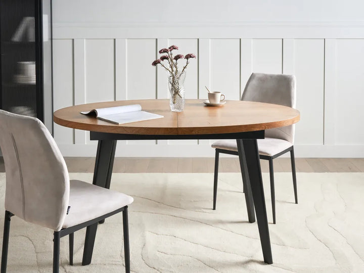 Dining table with chairs in a modern room setting