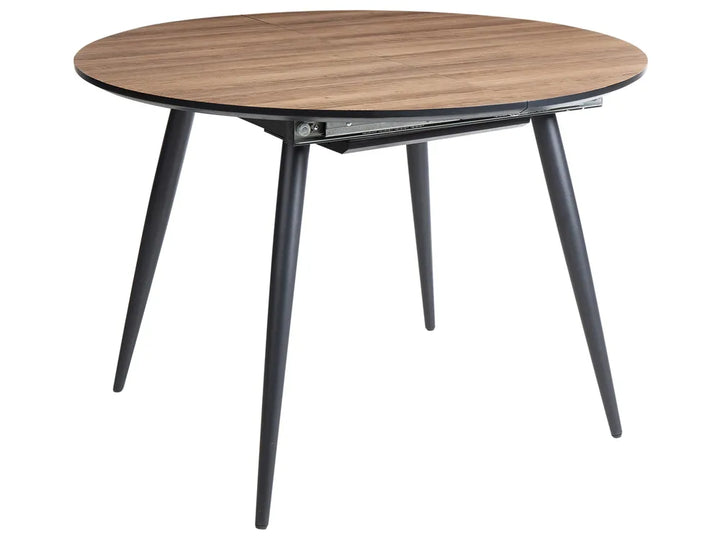 Round wooden table with black metal legs on a white background