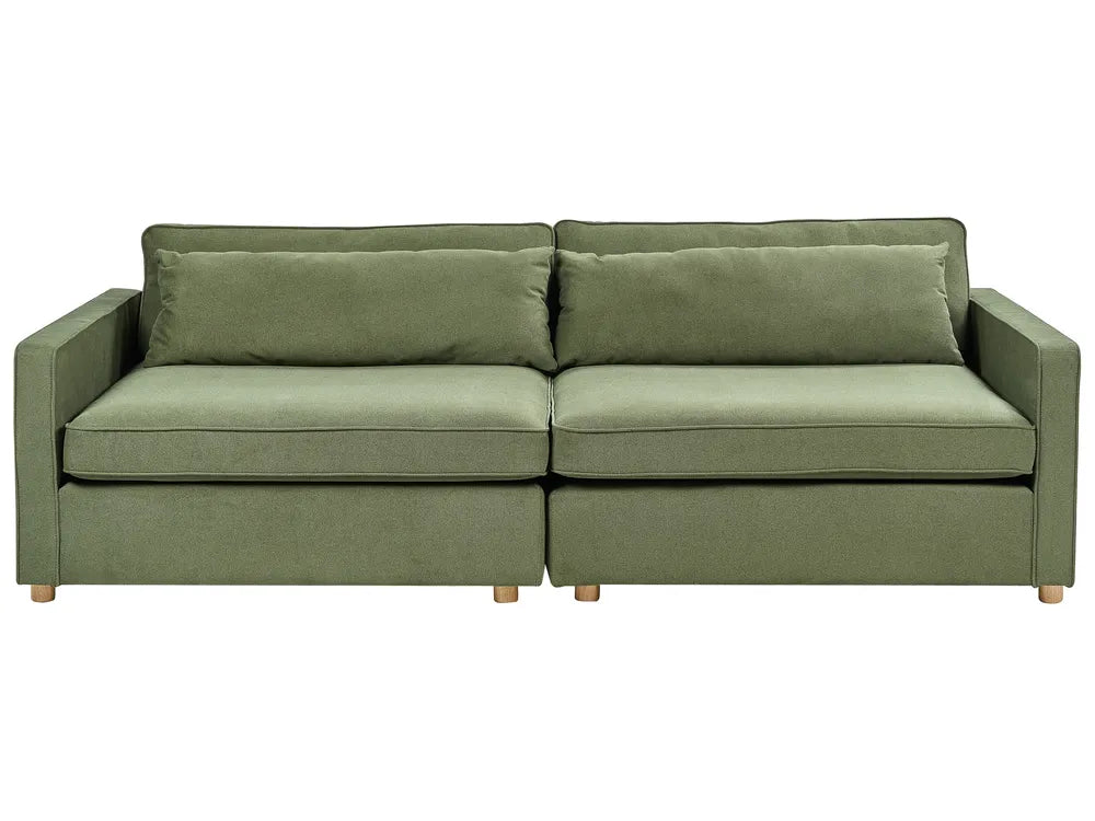 Green sofa with two cushions on a white background