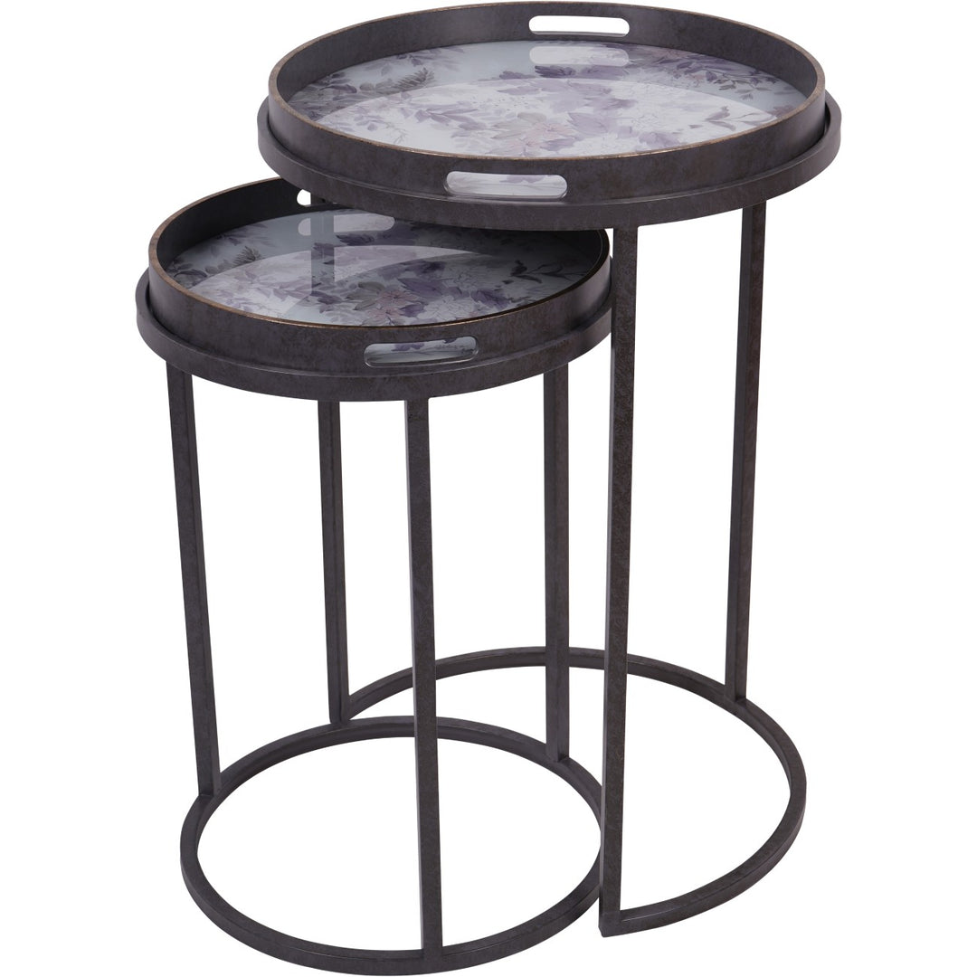 Set of two black metal nesting tables with glass tops on a white background