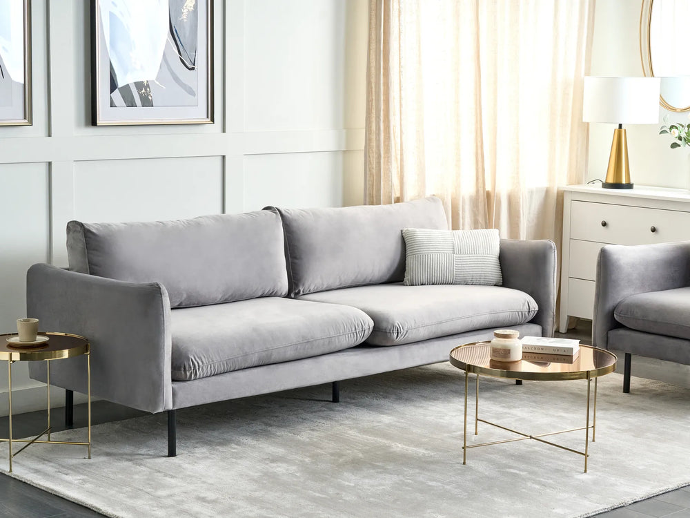 Grey velvet three seater sofa for comfortable living room seating