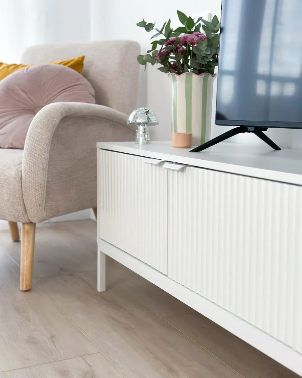 White TV unit with drawers and shelves