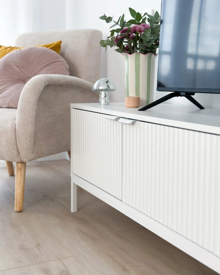 White TV unit with drawers and shelves