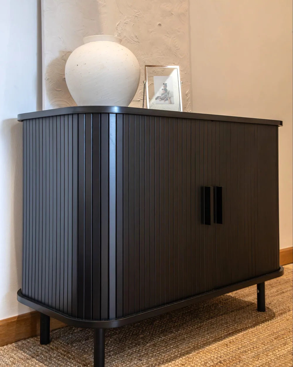 Black storage cabinet with two doors