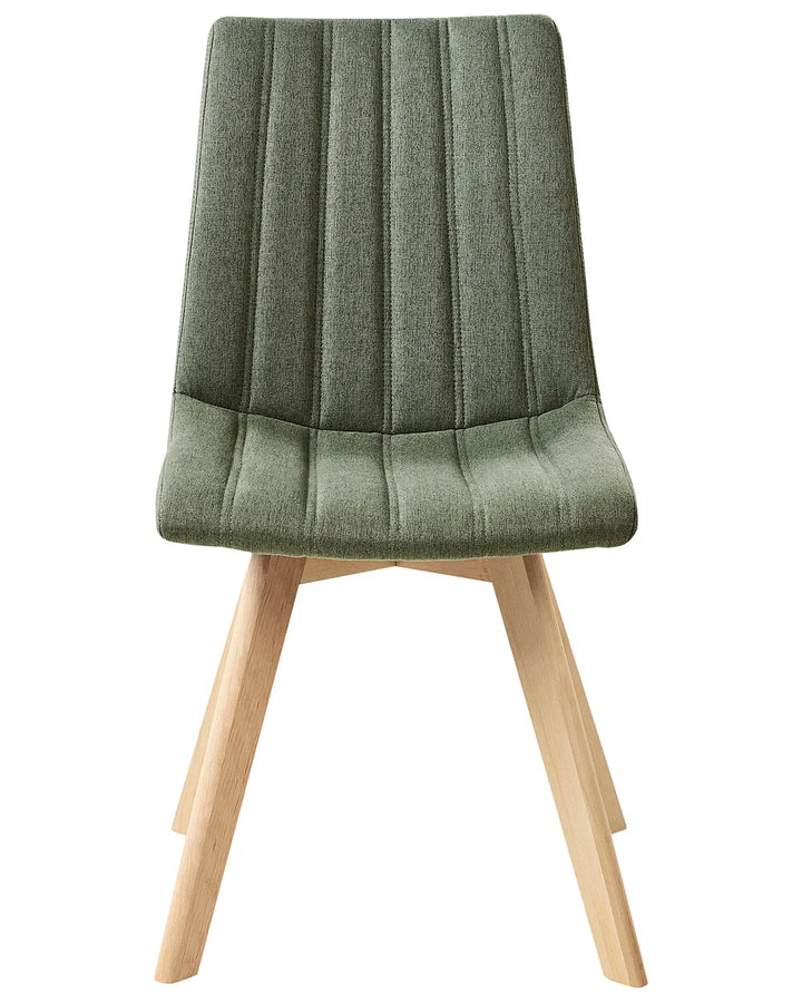 Green upholstered chair with wooden legs on a white background