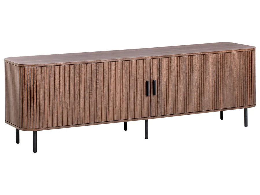A modern long sideboard cabinet with a curved front, vertical wood slat panel doors, two black handles, and slim black legs, shown on a plain white background.
