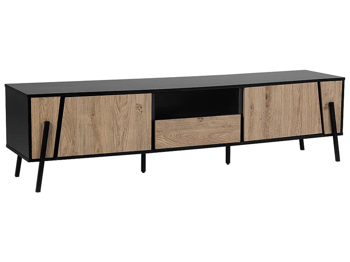 A modern media console with light oak wood doors and a black top