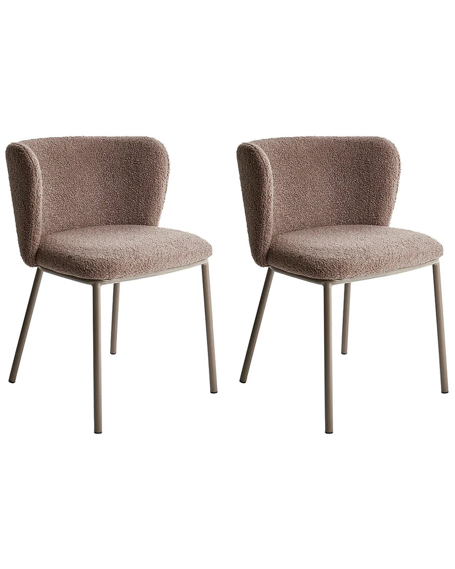Two brown upholstered chairs with metal legs on a white background