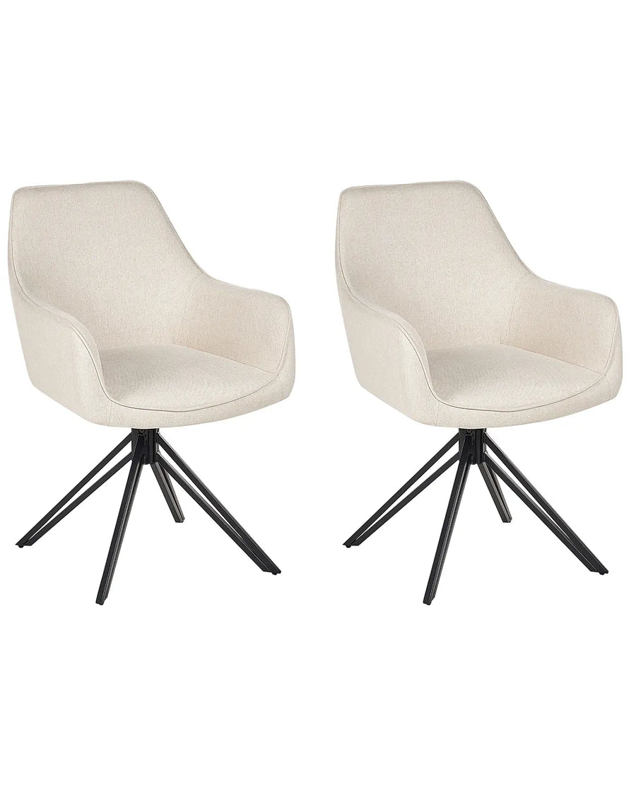Two modern swivel dining chairs with cream-colored upholstered seats and black metal starburst bases, shown side-by-side on a plain white background.