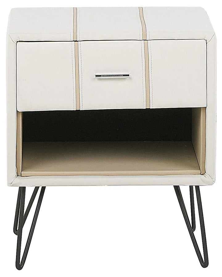 A modern two-drawer nightstand with a cream faux leather exterior, vertical stitched stripe details, a silver metal handle, and black hairpin legs, shown against a plain white background.