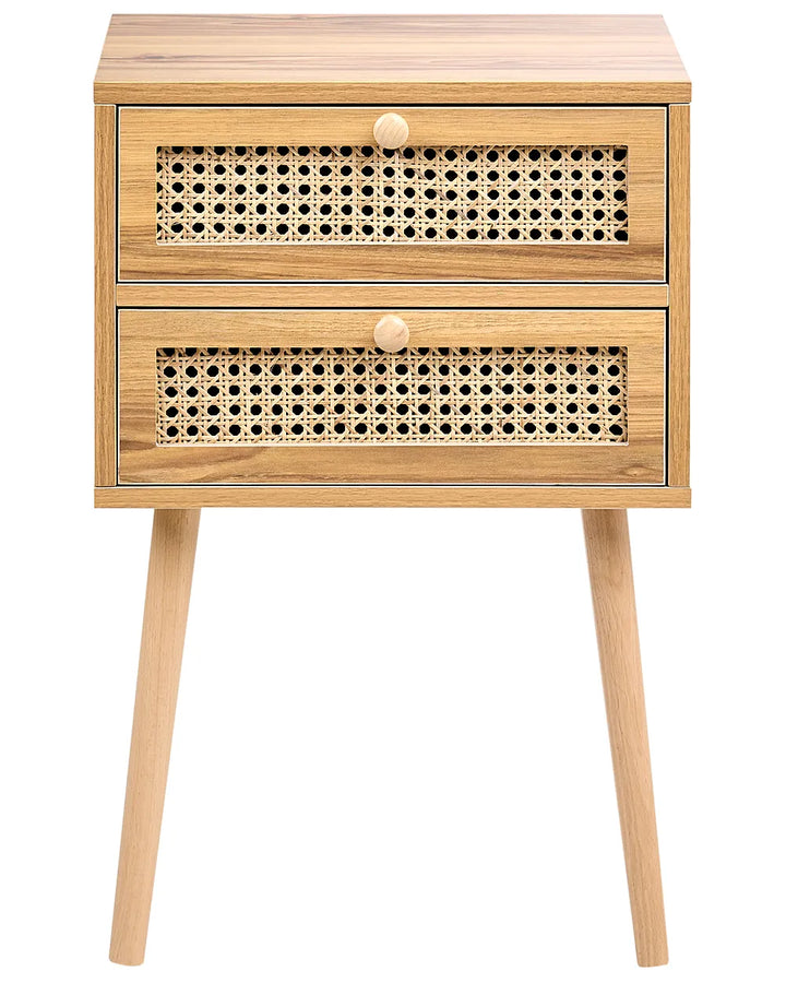 A light natural wood two-drawer nightstand with woven cane panels on the drawer fronts and tapered wooden legs, shown on a plain white background.