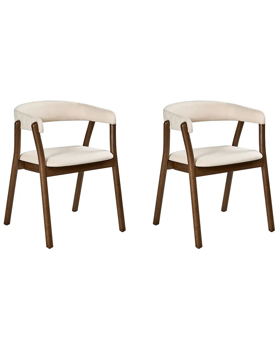 Two modern dining chairs with curved cream upholstered backs and seats on dark brown wooden frames, shown against a plain white background.