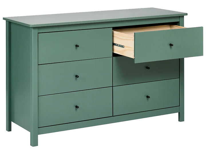 A six-drawer dresser in a muted sage green finish, with one top drawer pulled open to show a light natural wood interior. The dresser has small black round knobs and is photographed on a clean white background.