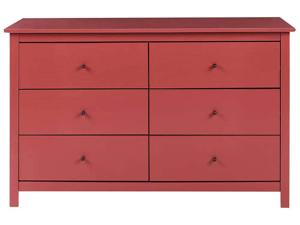 A six-drawer wooden dresser in a muted terracotta red color, featuring small round black knobs and a flat top, shown against a plain white background.