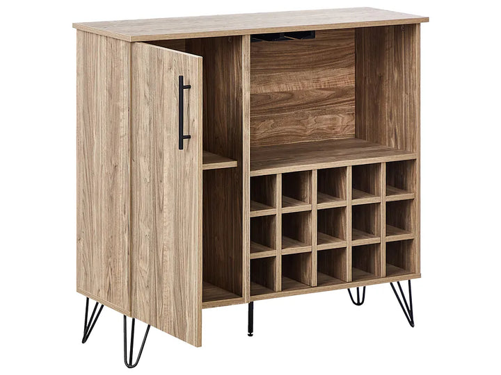 A modern bar cart with a light oak wood grain finish, featuring a single open door with a black handle, open shelving, a wine bottle storage grid, and hairpin style legs.