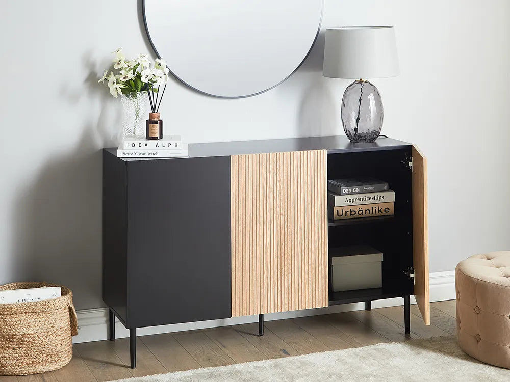 Modern sideboard with wooden and black design in a room setting.
