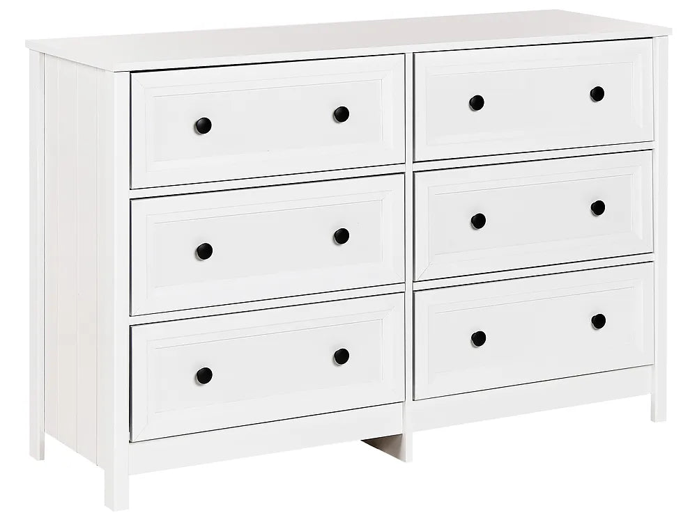 A white six-drawer dresser with small black round knobs, shown on a plain white background.